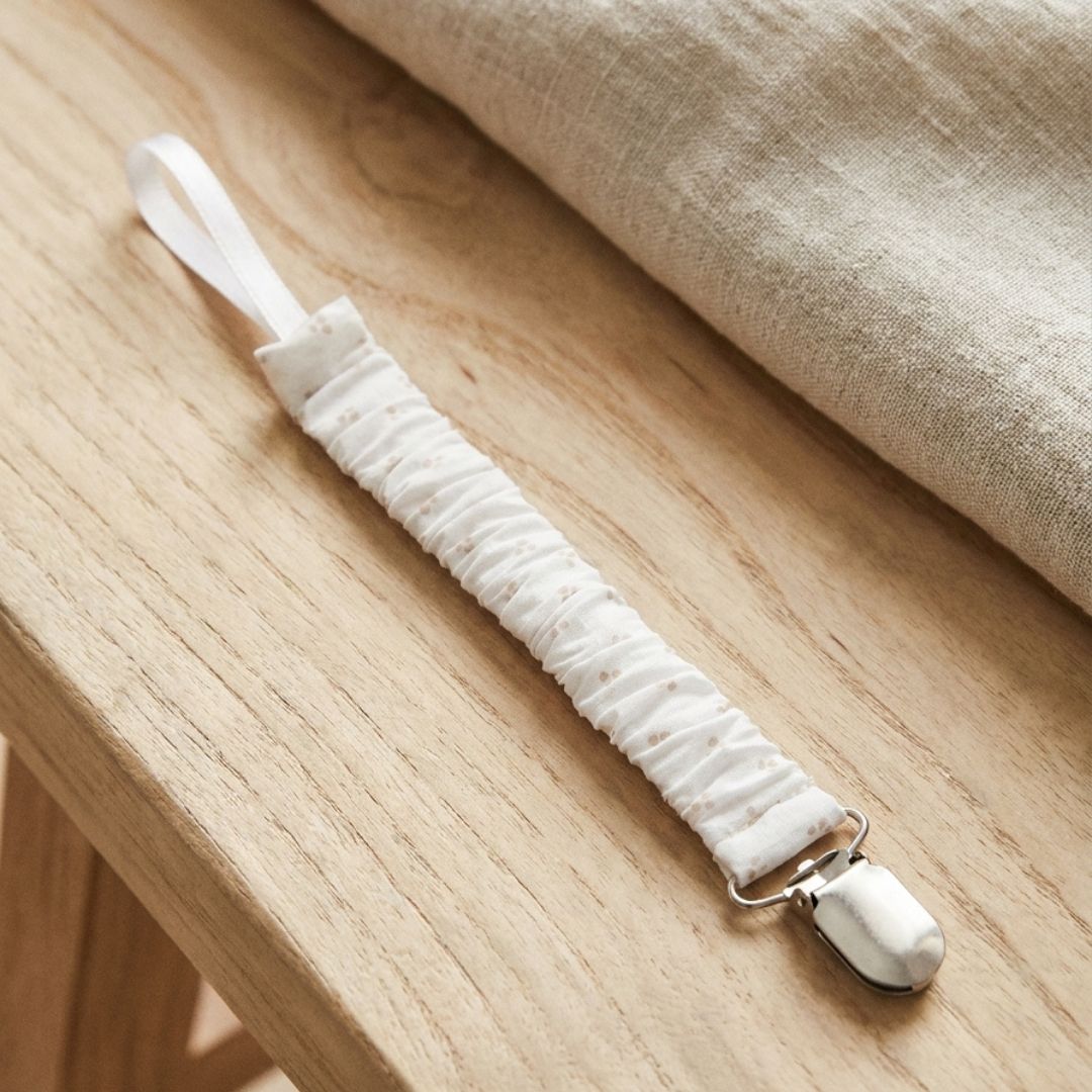 Chupetero Huellas Rosa