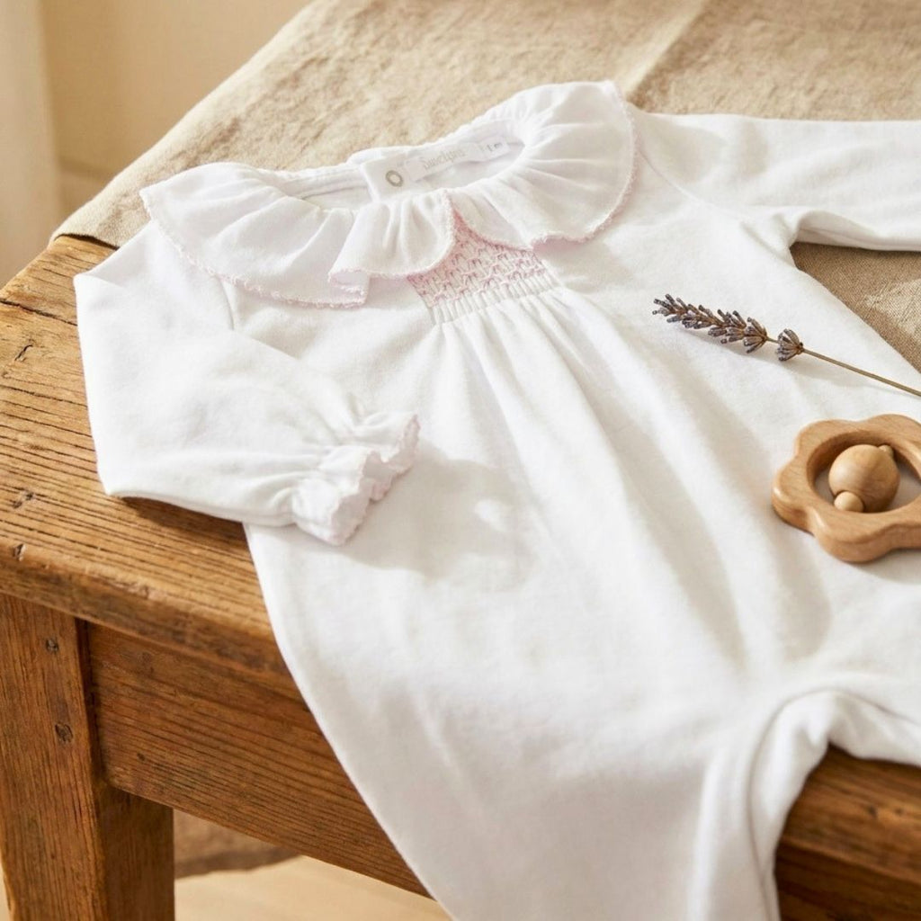 Pijamita con nido de abeja rosa